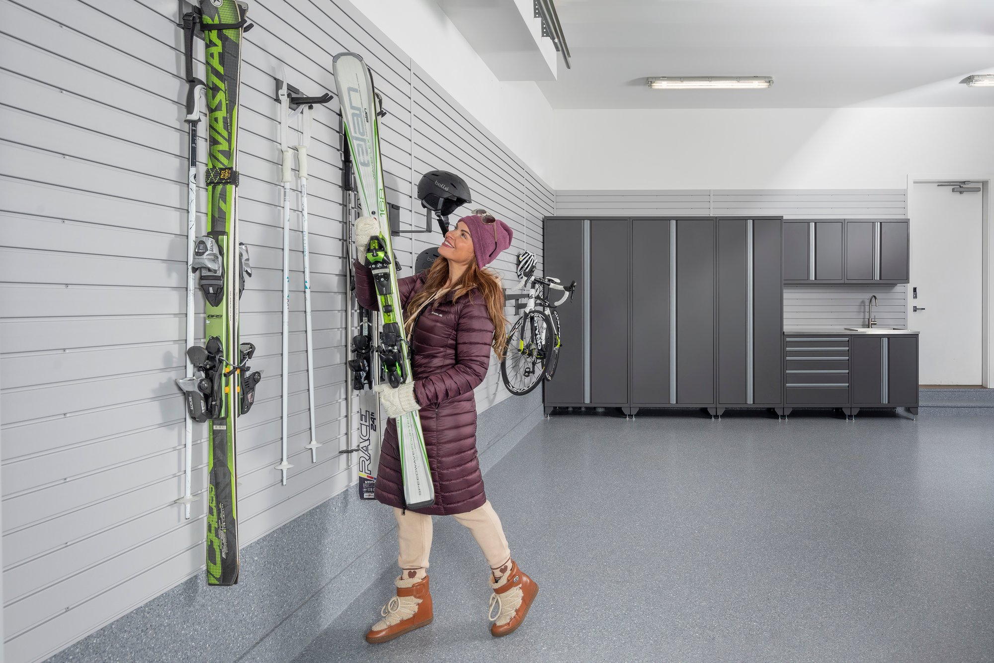 Slatwall storage for ski by Garage Living