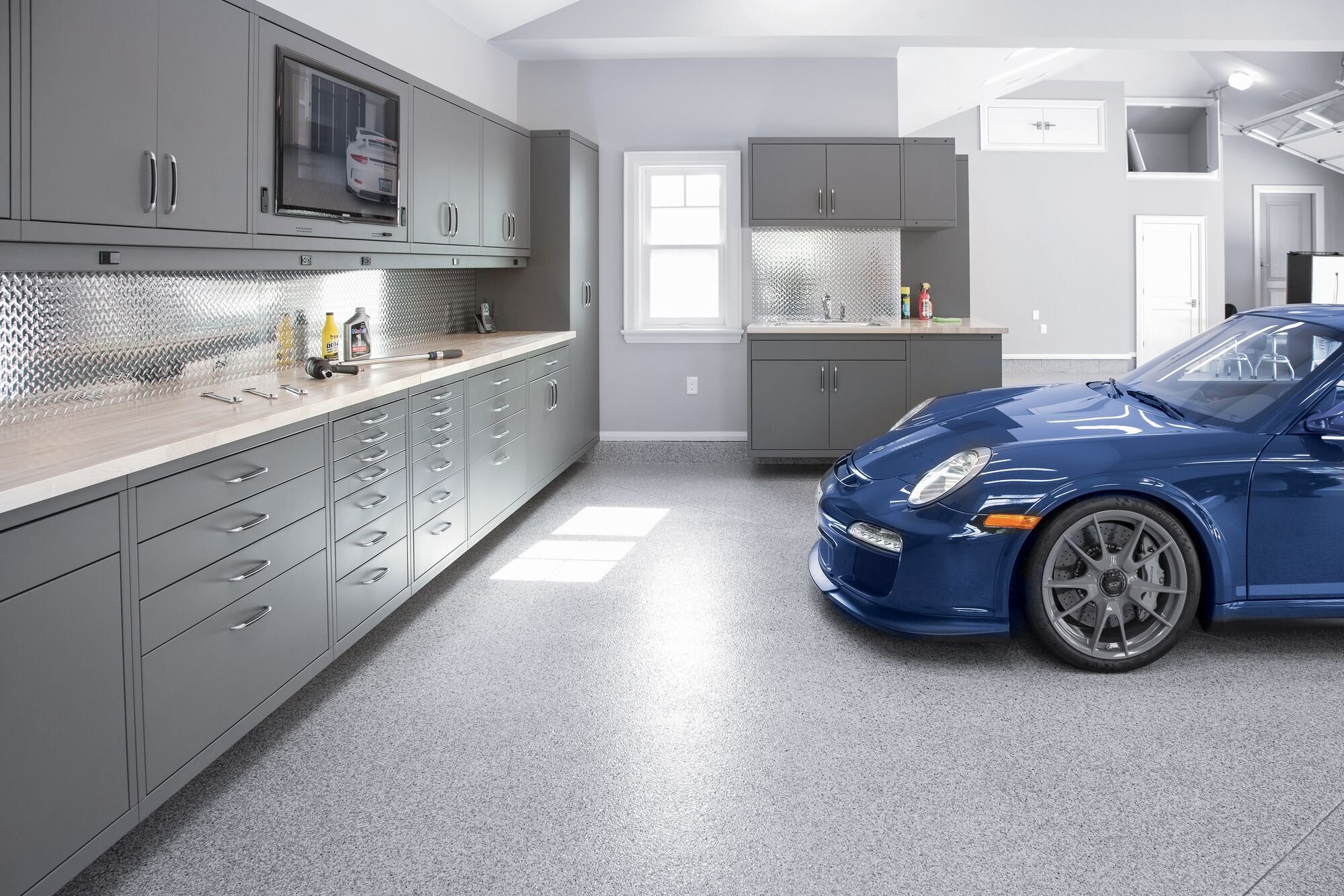 “From sports cars to family SUVs”: When life changes, your garage should too - Garage Living