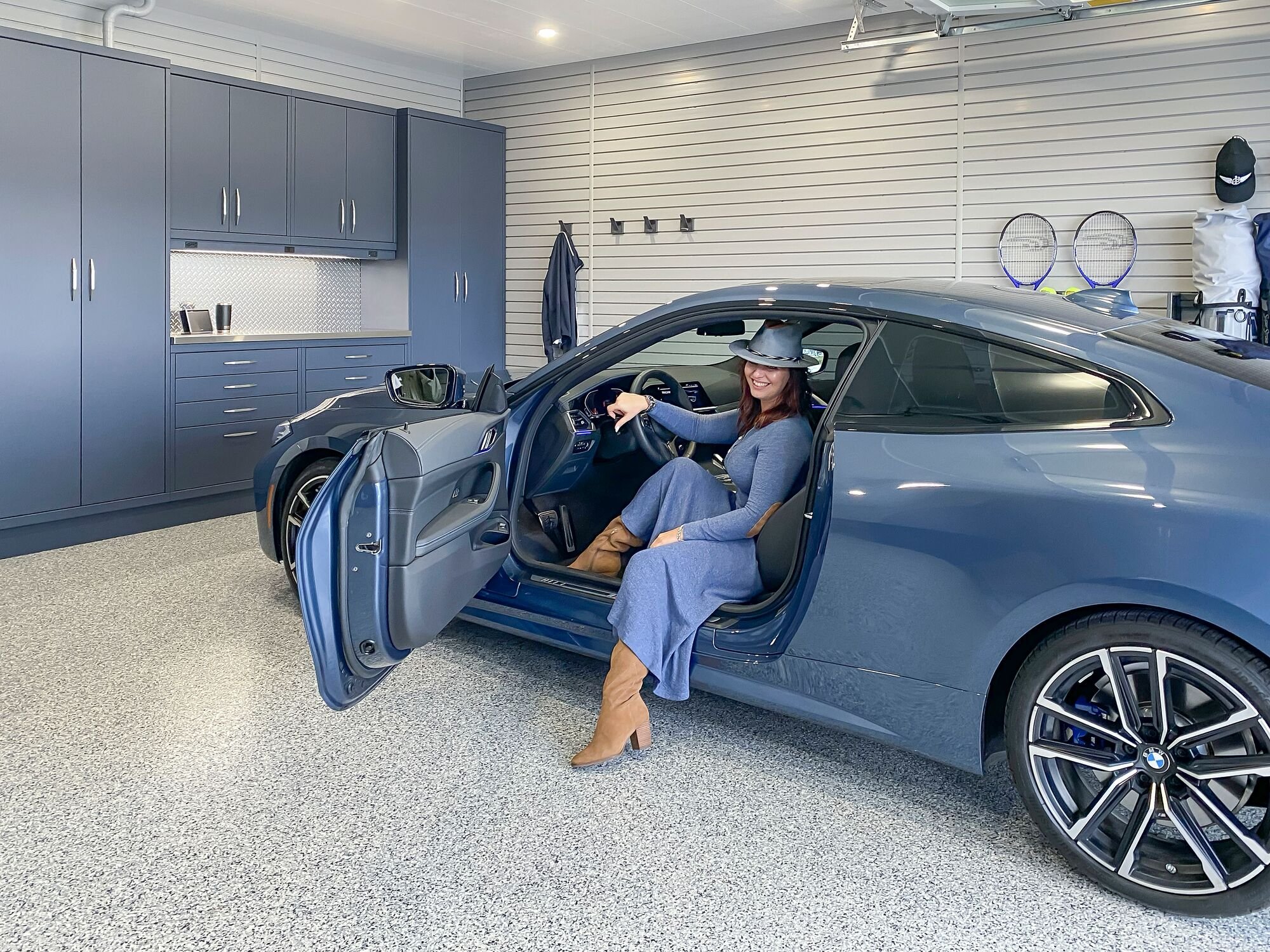 Woman with style coming out of BMW by Garage Living