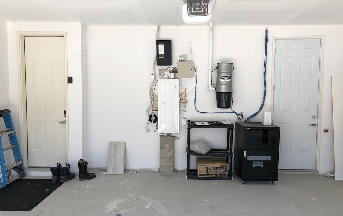 unfinished cluttered garage before makeover