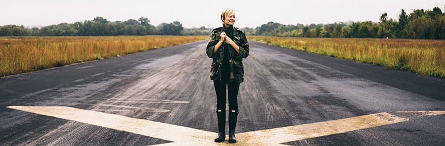 Tudor Designer Series Inspiration - woman in the middle of the road- Garage Living